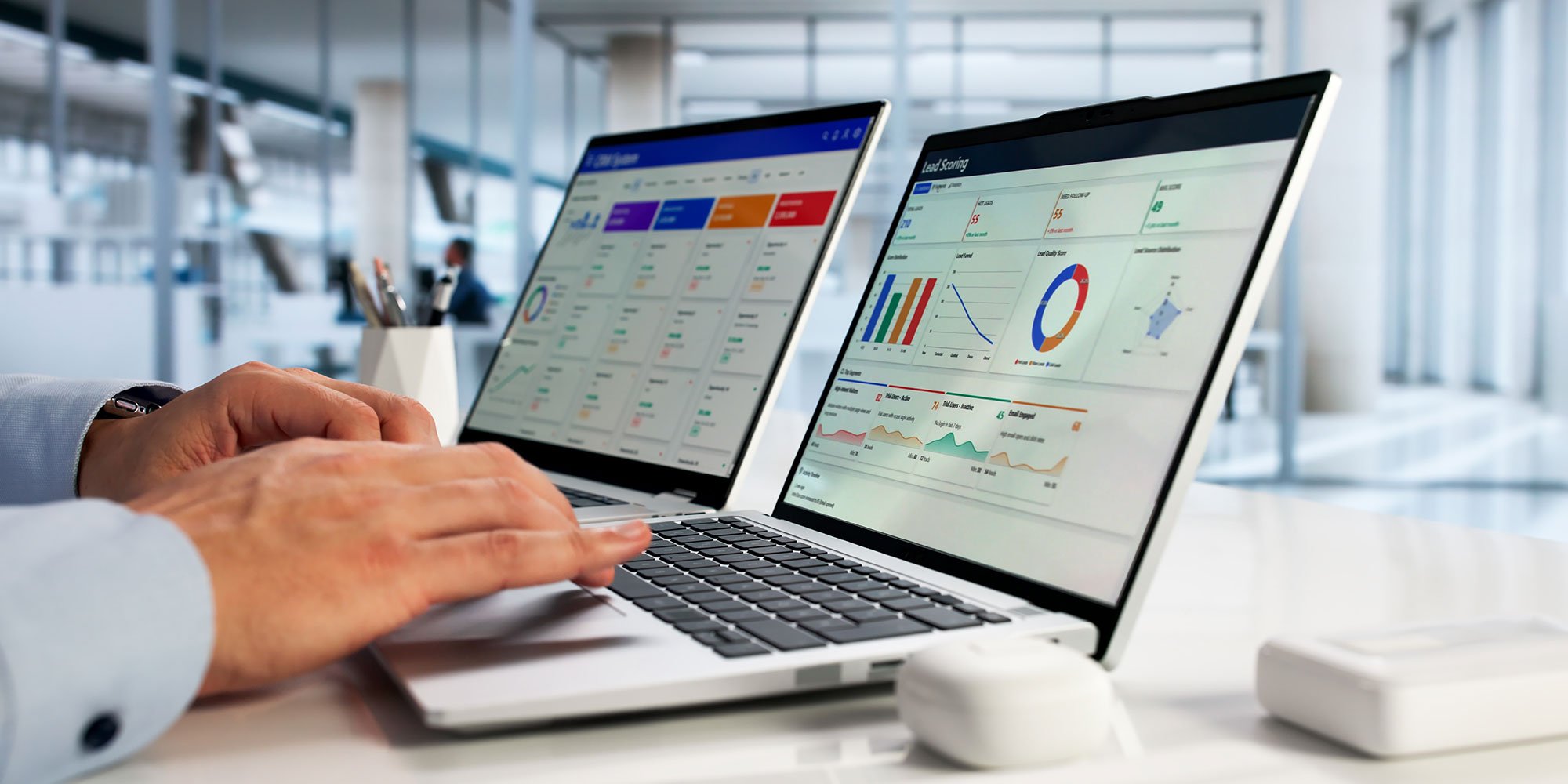 person on laptop looking at reports